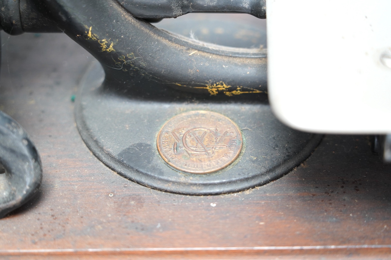 A late 19th/early 20th century Willcox & Gibbs swan neck sewing machine, with its original mahogany case, engraved brass owners label to top of case. Condition - fair to good